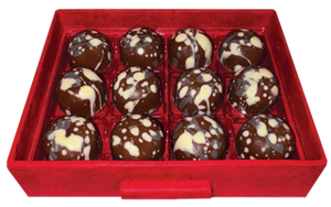 Decorated bonbons in a red box