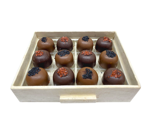 12 Caramel filled bonbons with dark and milk chocolate shells.